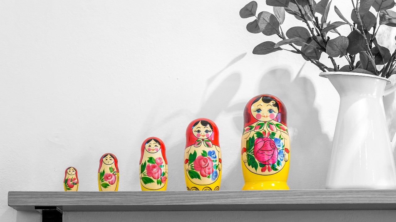 A set of matryoshka dolls displacing on shelf; image used for HSBC Compare Savings Accounts page.